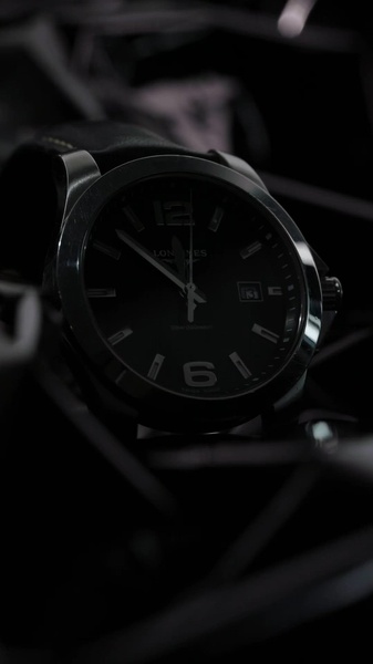 analog watch, leather strap watch, mens watch, luxury watch, wristwatch, brand awareness, editorial, minimalist, luxurious, calm, black, neutral