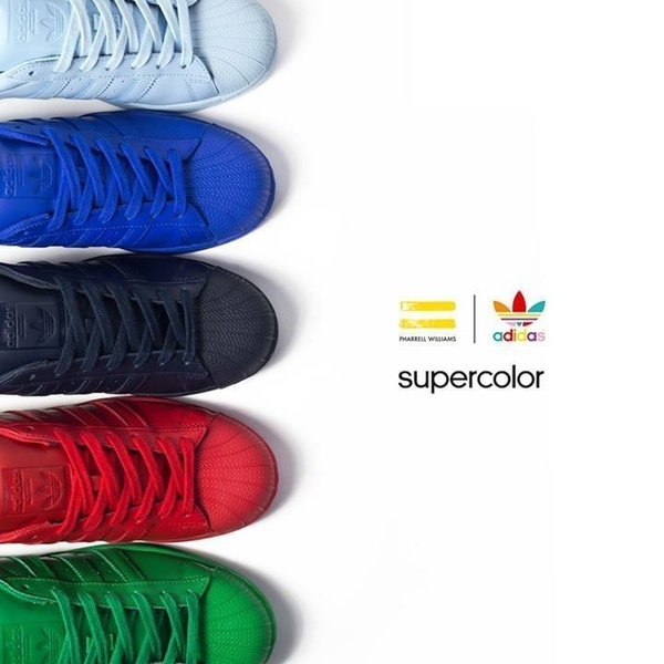 A clean, top-down view showing a row of five identical sneakers in different vibrant colorways against a high-key white background.