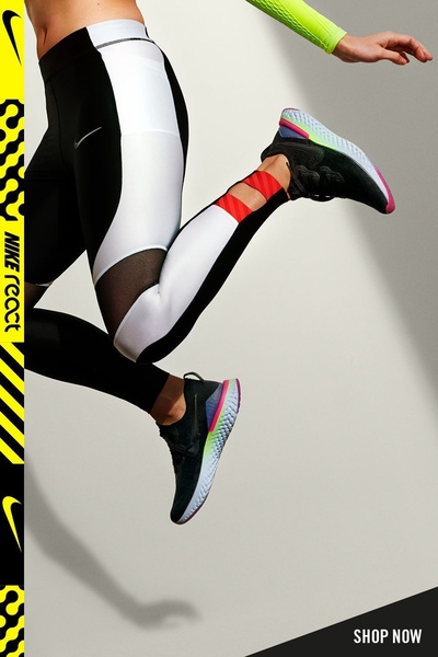 A dynamic shot of a runner mid-air, emphasizing the product's performance features against a clean, neutral backdrop.