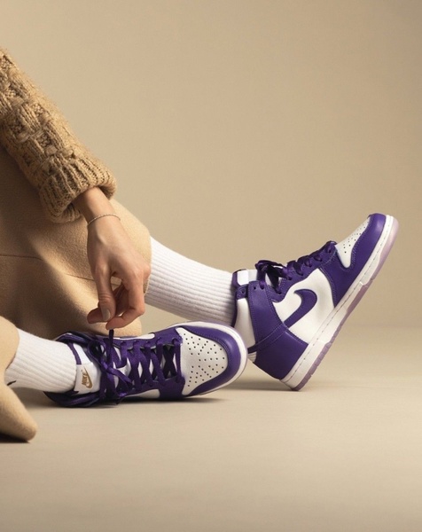 This creative focuses on a high-top sneaker product hero shot, utilizing a soft, neutral color palette to emphasize the product design and texture.