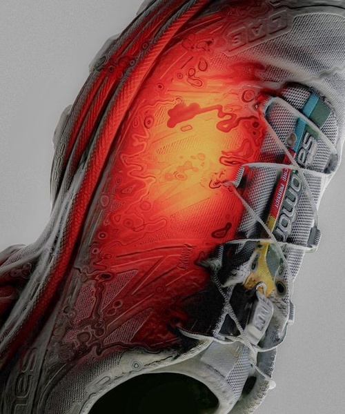 A close-up, high-angle shot of a technical running shoe with a glowing, red thermal-map overlay highlighting the midfoot structure.