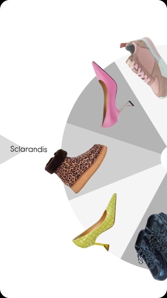 A dynamic 9:16 vertical creative featuring a spinning wheel interface displaying various shoe styles to engage the viewer.