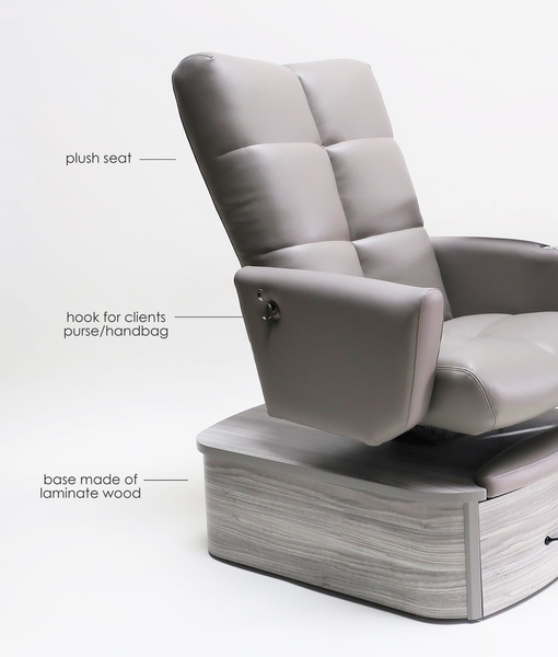 A clean, studio-lit shot of a luxury pedicure chair with explicit callouts highlighting the plush seating, client accessory hook, and laminate wood base.