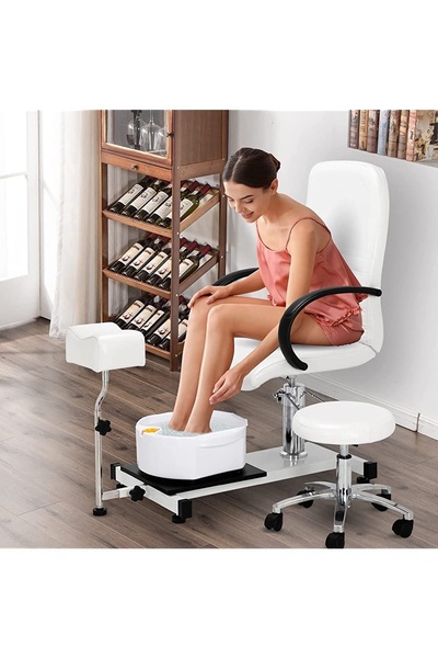 A high-quality studio shot of a woman using a home pedicure chair, highlighting the comfort and lifestyle appeal of the equipment.