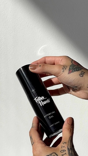 tattoo aftercare, tattoo gel, tattoo lotion, skincare gel, tattoo ointment, product demo, minimalist, lifestyle, calm, trustworthy, black, neutral