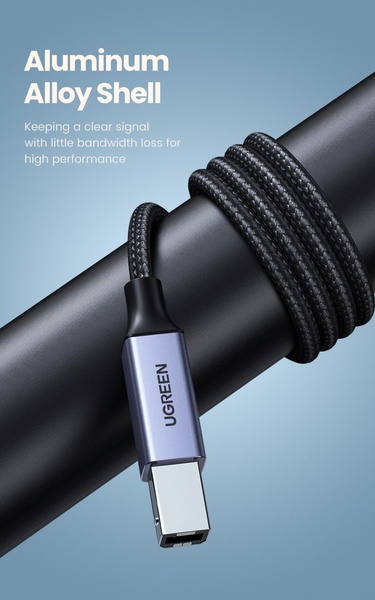 A close-up, high-contrast product shot of a high-quality braided USB cable focusing on the aluminum alloy connector shell.