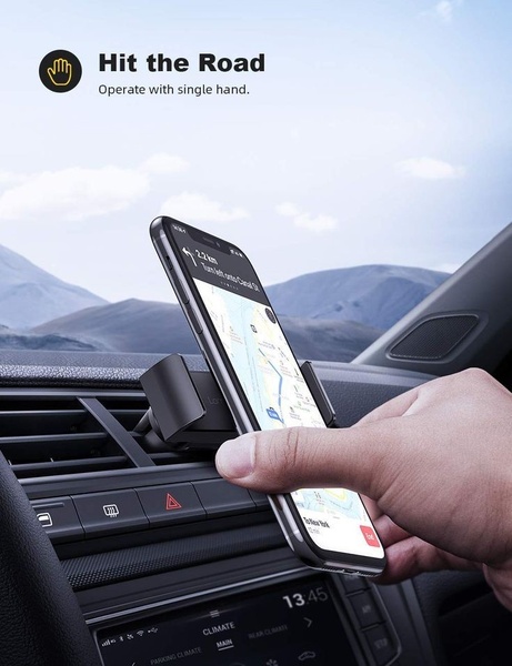 This creative demonstrates the core utility of a car phone mount, showing a hand effortlessly placing a phone into the mount while driving.