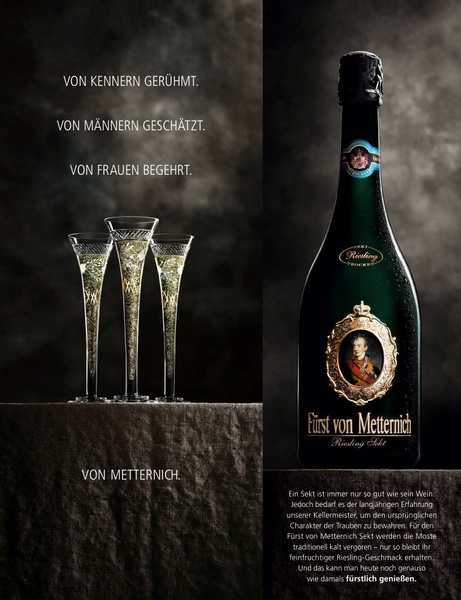 A high-end advertisement showcasing a bottle of Sekt alongside three glasses, utilizing dark, moody lighting to convey premium quality and tradition.