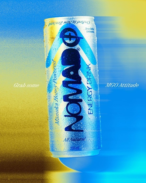 A high-energy, vertical hero shot of a single energy drink can set against a dynamic, motion-blurred yellow and blue background.