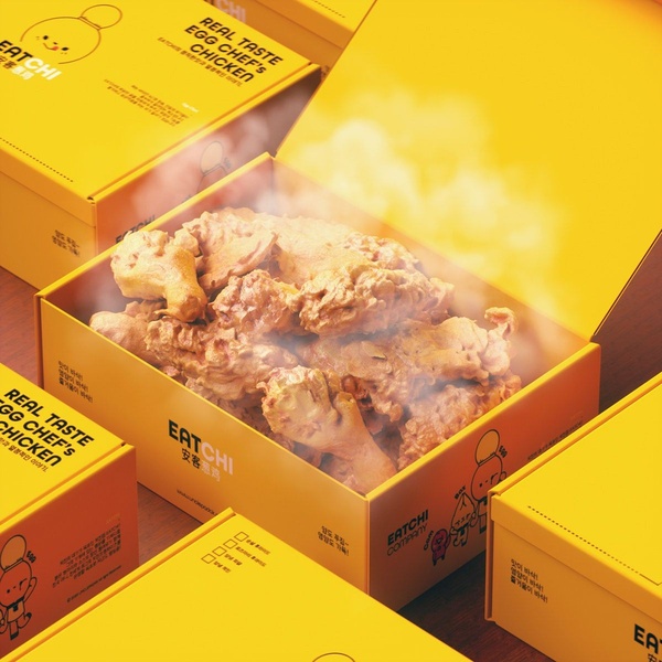 A high-quality studio shot of a freshly prepared fried chicken box, highlighting warmth and freshness through vibrant yellow packaging and visible steam.