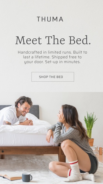 This ad creative features a clean, high-key photography style showing a couple in a relaxed bedroom setting with a minimalist wooden bed frame.