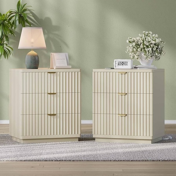 A high-end, symmetrically composed product hero shot featuring two matching nightstands in a calm, sage-toned minimalist bedroom.