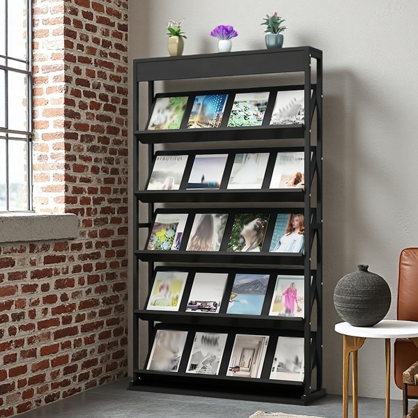 A high-quality, balanced display of a metal magazine rack staged in a modern loft interior to highlight functionality and design.