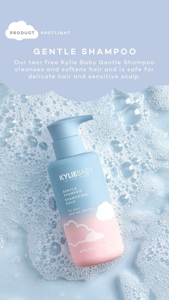 A soft-focus product photography creative featuring a Gentle Shampoo bottle surrounded by soap suds on a light blue background.