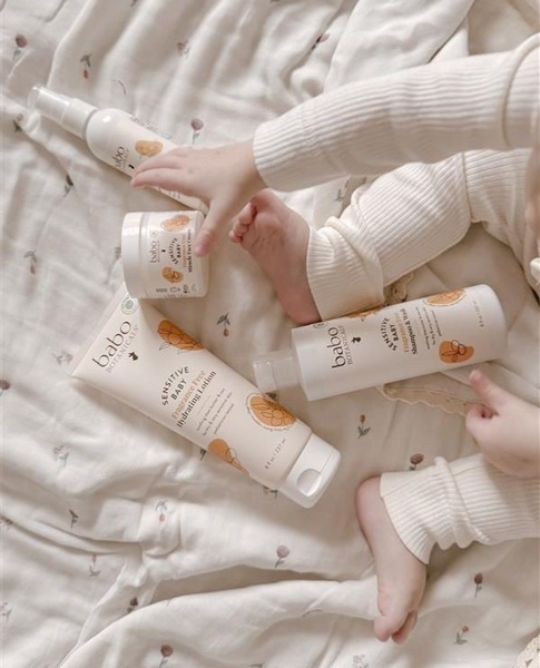 baby lotion, baby shampoo, baby body wash, baby face cream, baby skincare set, new arrival, lifestyle, flat lay, calm, warm, neutral, pastel