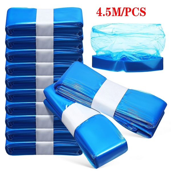 A high-contrast, clean 1_1 image showcasing multiple stacked packs of blue disposable shoe covers to emphasize bulk quantity and product readiness.