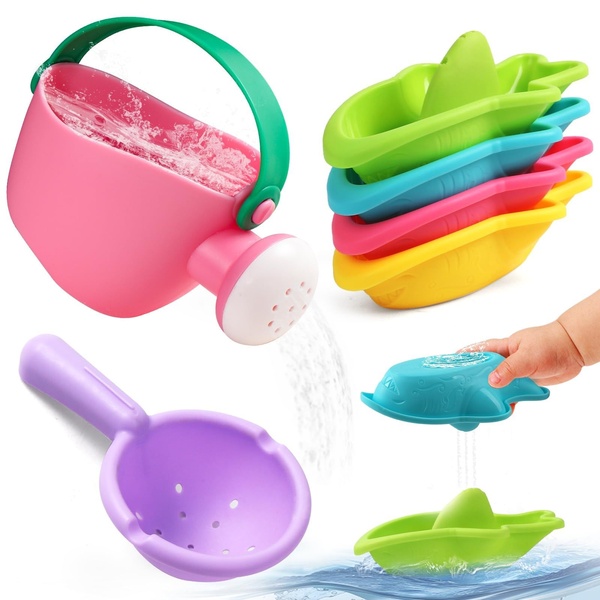 This ad creative displays a colorful collection of baby water toys, including a pink watering can and stackable shark-shaped cups, highlighting their interactive play potential.