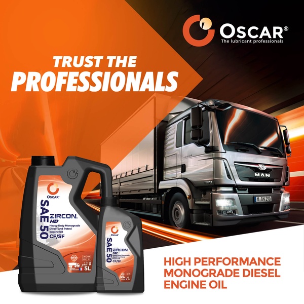 A high-performance promotional image for heavy-duty diesel engine oil featuring a semi-truck on a motion-blurred highway.