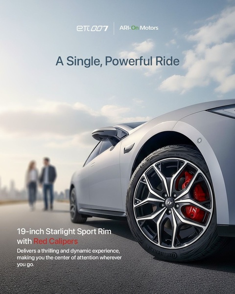 A close-up of a high-performance sport car rim featuring red calipers, emphasizing a dynamic and thrilling driving experience.