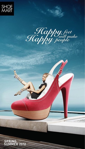 A high-heel shoe functions as a giant armchair for a model, creating a whimsical and eye-catching surrealist visual.