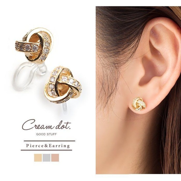 A split-screen ad creative displaying a high-quality product detail shot alongside an on-ear lifestyle preview of knot earrings.