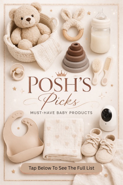 A clean, high-angle flat-lay photograph featuring a selection of baby essentials including a teddy bear, pacifier, baby monitor, and organic textiles.