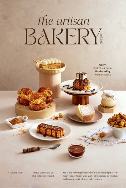 A sophisticated, warm-toned display of artisan pastries and desserts presented with professional studio styling.