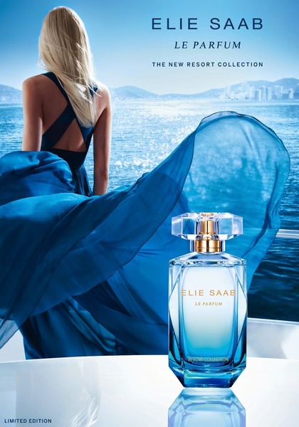 A high-end product advertisement featuring a perfume bottle placed on a yacht deck against a coastal backdrop, evoking a luxury resort atmosphere.