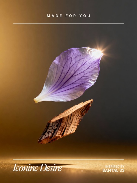 This creative showcases a refined, floating aesthetic where a delicate petal and a piece of wood are suspended in light to evoke a sense of premium scent profile.