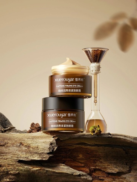 A high-end, studio-lit photograph featuring two jars of caffeine eye cream placed on a weathered wooden surface, with a laboratory funnel and coffee beans, emphasizing an organic yet scientific aesthetic.