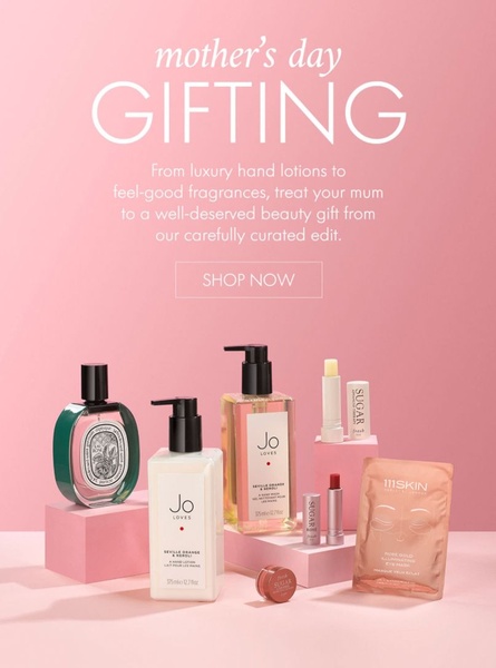 A high-end, minimalist product layout showcasing premium beauty items arranged on pink blocks for a cohesive brand experience.