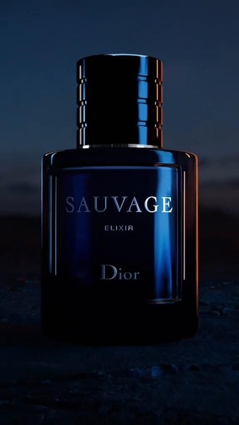 A high-end product hero shot featuring a perfume bottle against a dark, moody background with subtle rim lighting to emphasize texture.