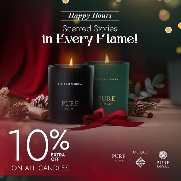 A seasonal, moody product ad featuring two scented candles with a festive bow and pine decor, highlighting a 10% discount.