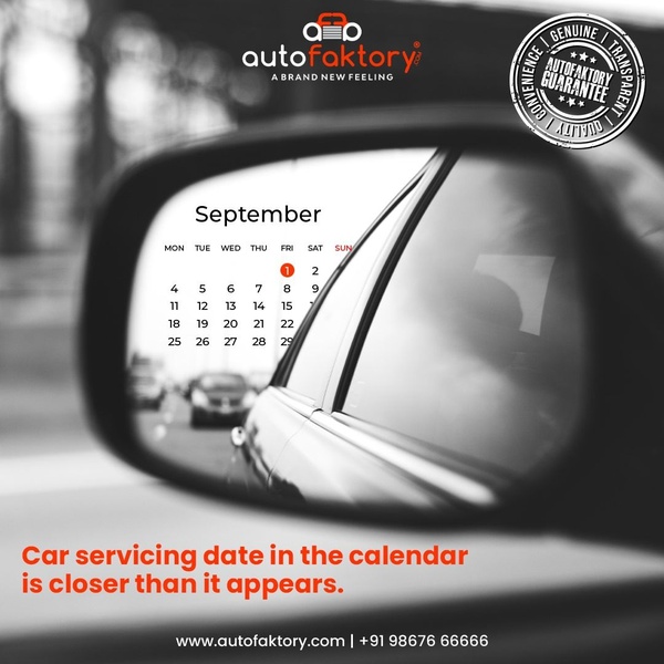 A high-contrast, black-and-white image looking through a car side mirror at a September calendar, emphasizing that maintenance dates arrive faster than expected.