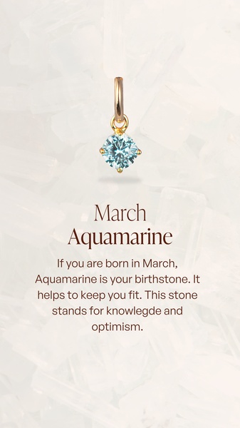 A refined product hero shot featuring a March aquamarine pendant centered against a textured light background, emphasizing birthstone significance.