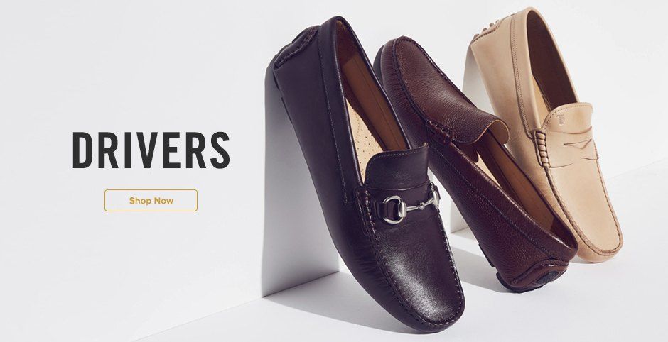 A high-end studio shot of leather driving loafers displayed against a clean, minimalist white background with bold typography.