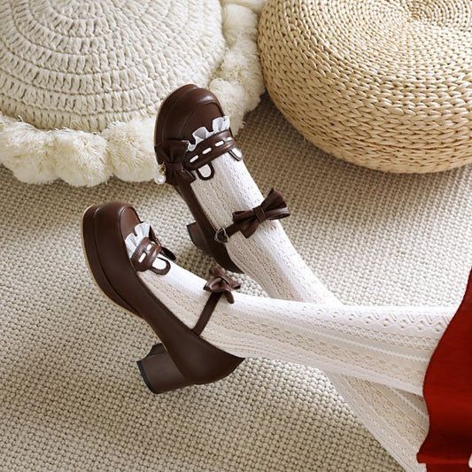 A close-up, high-aesthetic shot of brown Mary Jane shoes with white lace socks, highlighting intricate details and a soft, feminine mood.