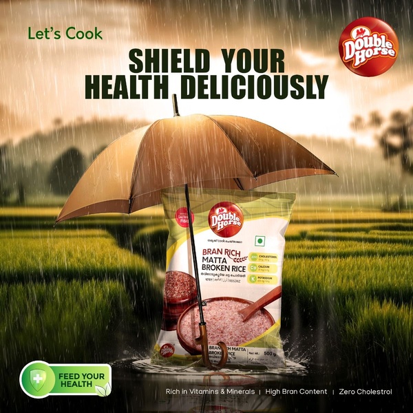 This ad features a pack of Bran Rich Matta Broken Rice protected under an umbrella in a field, communicating health and nutritional value through visual metaphor.
