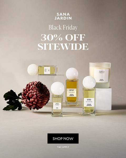 A clean, minimalist product arrangement featuring a range of perfumes and a scented candle, highlighting a 30% discount for Black Friday.
