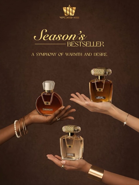 A sophisticated, high-contrast hero shot featuring three perfume bottles held in open hands against a rich brown backdrop to emphasize warmth and luxury.