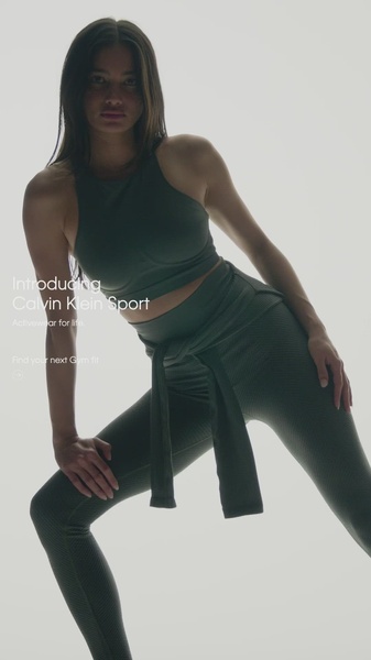 activewear set, workout outfit, gym leggings, sports crop top, athletic wear, fitness clothing, product launch, brand awareness, editorial, minimalist, bold, luxurious, neutral, green