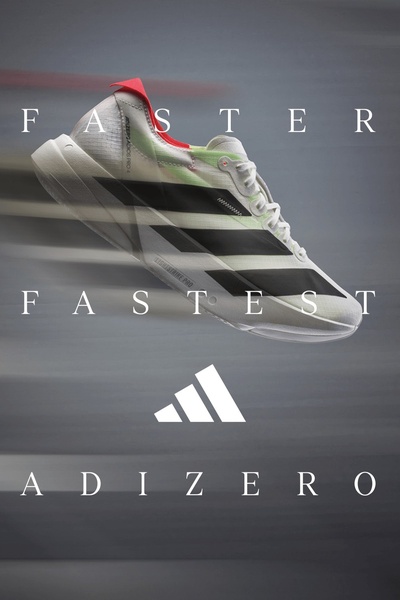 A high-performance running shoe depicted in a state of high-speed motion against a clean, blurred background with bold, centered typography.