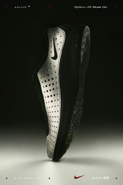 A high-contrast, studio-style product shot of a black and silver running shoe, emphasizing a clean aesthetic and the brand identity.