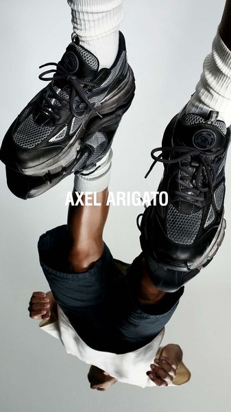 A high-angle, vertically-inverted creative showcasing a running shoe from a unique perspective to create a surreal and eye-catching visual effect.