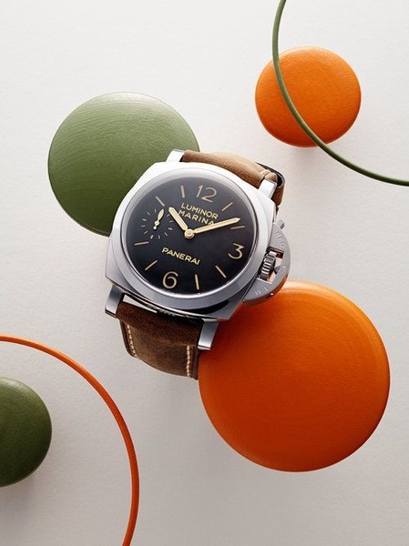 wristwatch, luxury watch, analog watch, leather strap watch, dress watch, mens watch, product launch, brand awareness, editorial, flat lay, luxurious, bold, orange, green, brown
