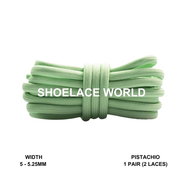 A clean, high-resolution product shot of pistachio-colored shoelaces, emphasizing color clarity and technical specifications like width.