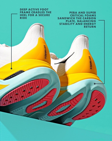 A close-up, high-vibrancy product shot of a running shoe with callouts explaining its core technology, including the foot frame and foam-carbon plate sandwich construction.