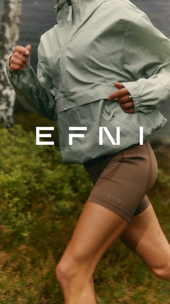 This ad creative features a high-impact, low-angle shot of a runner in motion, emphasizing product durability and a premium lifestyle aesthetic.