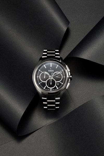 wrist watch, analog watch, chronograph watch, metal watch, automatic watch, minimalist, editorial, luxurious, bold, black, neutral