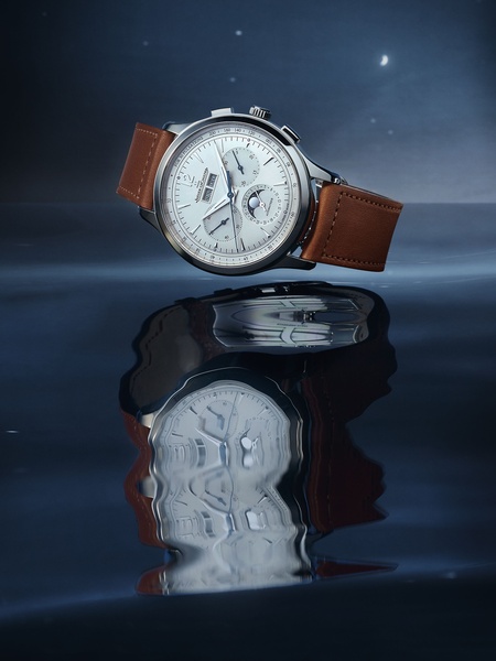 wrist watch, analog watch, leather strap watch, mens luxury watch, automatic watch, mechanical watch, brand awareness, minimalist, editorial, luxurious, calm, blue, brown, neutral